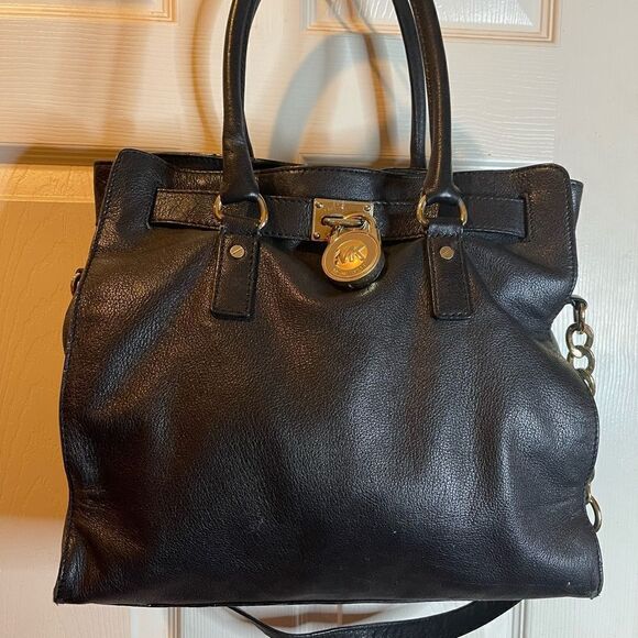 Michael Kors black leather large shoulder bag with gold tone accents. - Picture 1 of 14